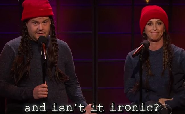 Alanis Morrissette in the video to Ironic, with the caption 'Isn't it ironic, don't ya think?'