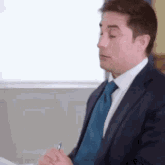 Jonathan Swan looking bemused during a Donald Trump interview