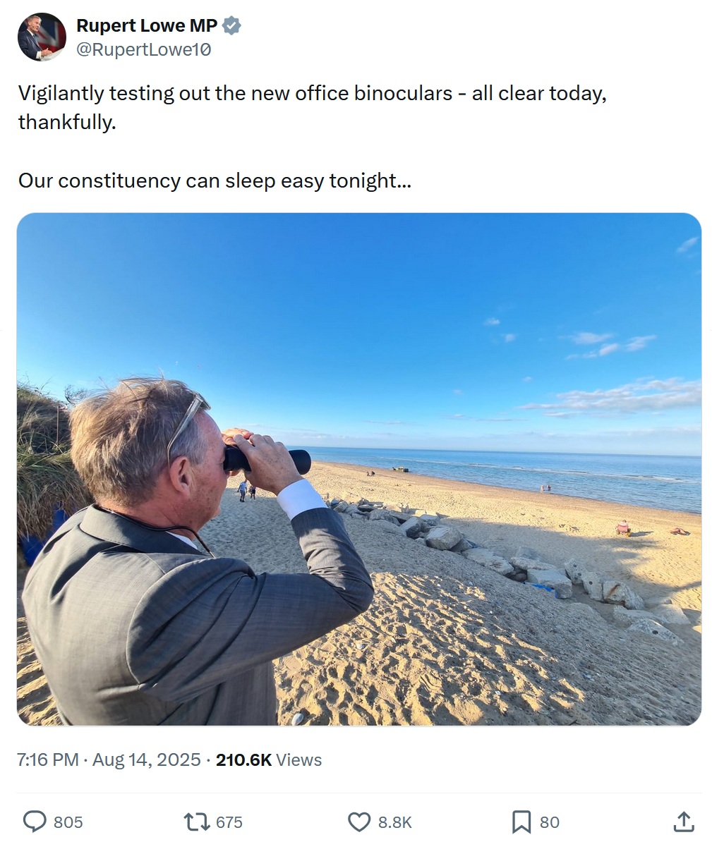 Vigilantly testing out the new office binoculars - all clear today, thankfully.

Our constituency can sleep easy tonight...

With a photo of Lowe gazing through a pair of binoculars from the sand dunes