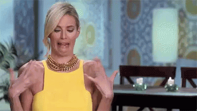 A woman shuddering and saying "ew"