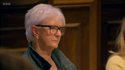 Linda from the Traitors looking to the camera