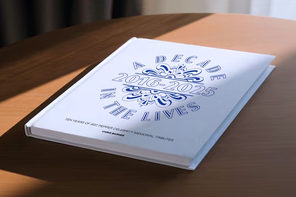 A large white book lying on a wooden surface. The title is 'A Decade in the Lives Ten years of Sgt Pepper celebrity tribute montages'