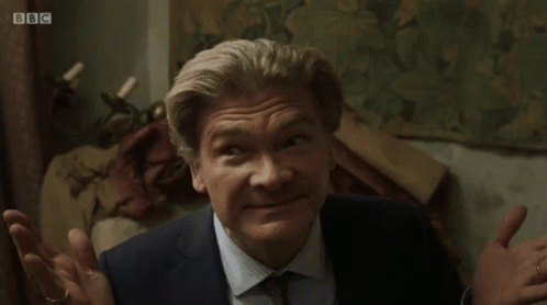 Simon Farnaby as Julian in BBC's Ghosts, shrugging