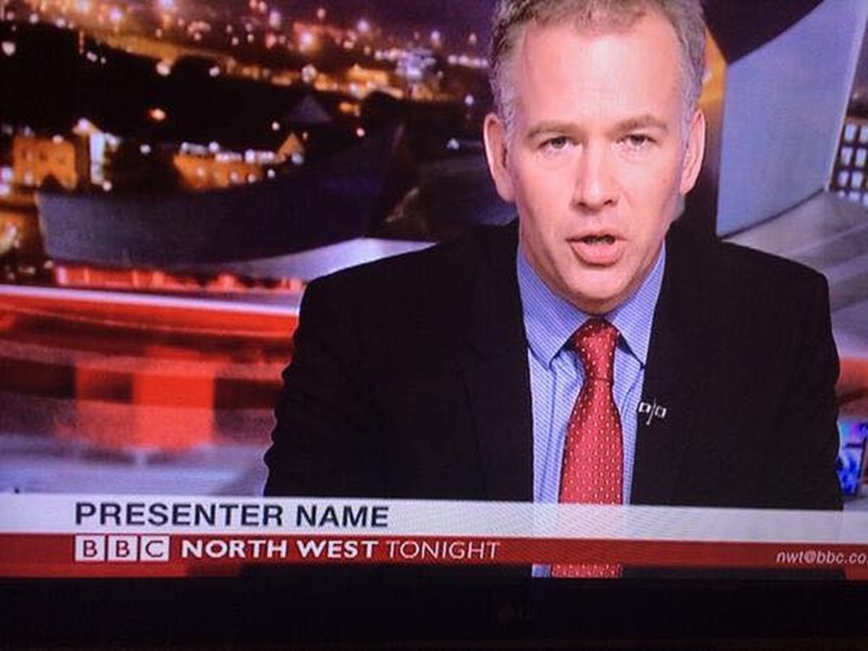 newsreader with Presenter Name written on the screen
