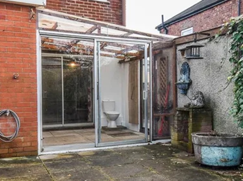 A closer view of the toilet in the lean-to