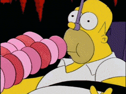 Homer eating doughnuts from an automatic doughnut-feeding machine