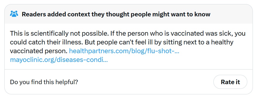 This is scientifically not possible. If the person who is vaccinated was sick, you could catch their illness. But people can't feel ill by sitting next to a healthy vaccinated person.