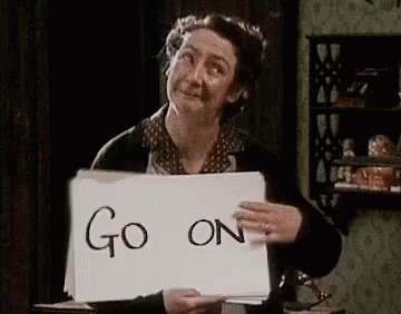 Mrs Doyle from Father Ted, revealing a series of large cards that just say 'Go on'