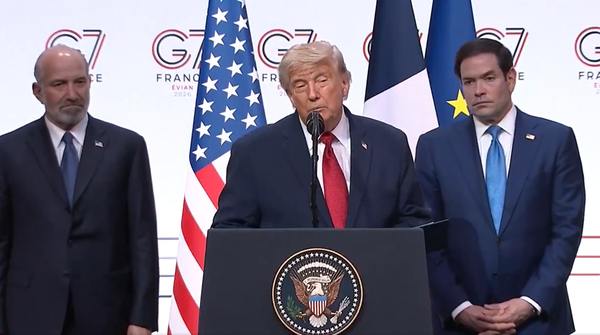 Howard Lutnick with a slight grimace on his face. Marco Rubio looking world weary. Trump standing in the middle.