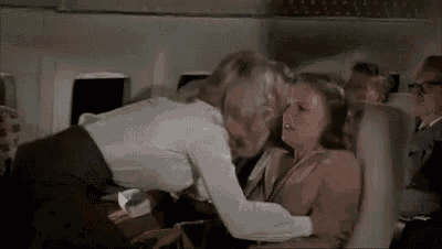 The Airplane scene where a queue of people all slap the same woman