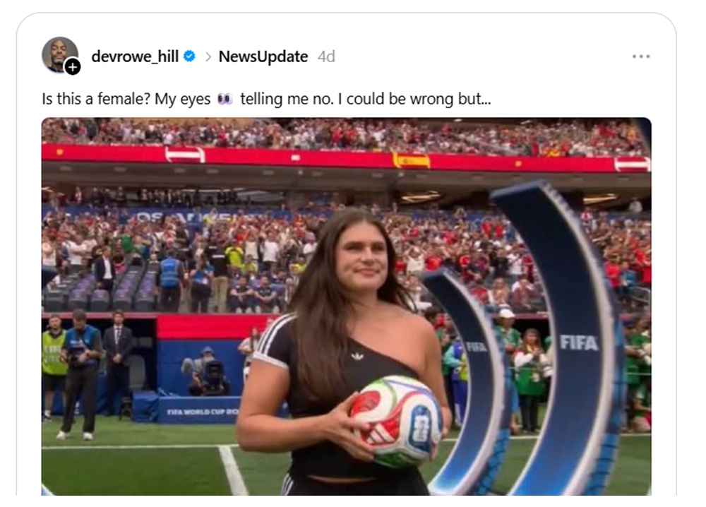 Devrowe Hill Threads post, Is this a female? My eyes 👀 telling me no. I could be wrong but... (Image shows Ilona carrying out the match ball, while she wears an off the shoulder Adidas black sports top)