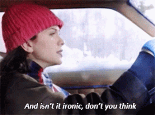 Alanis Morrissette in the video to Ironic, with the caption 'Isn't it ironic, don't ya think?'