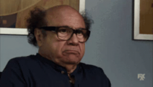 Danny DeVito shaking his head emphatically and saying No