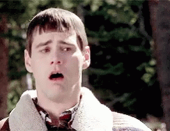 Jim Carrey dry0heaving in Dumb and Dumber